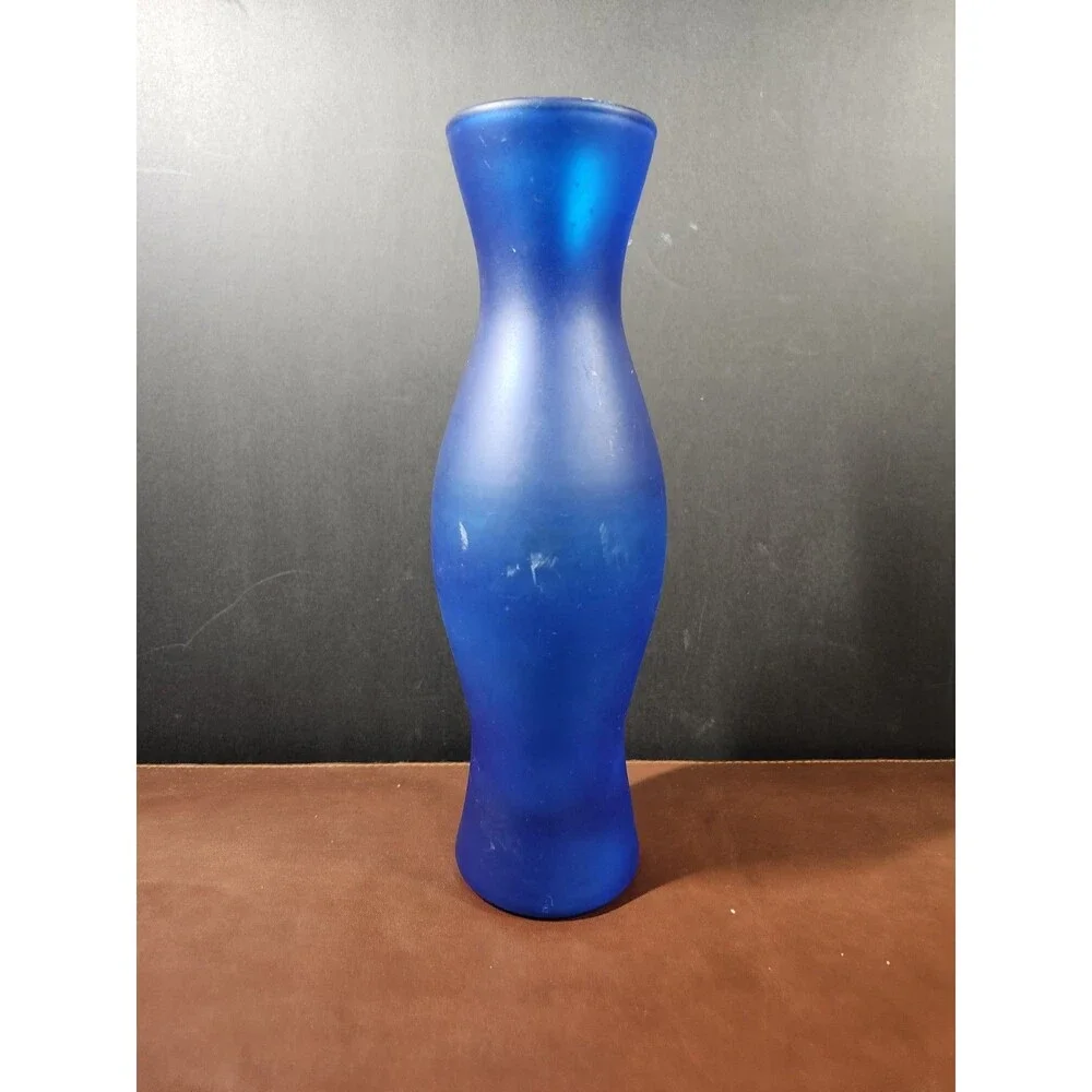 IKEA Salong blue glass vase, designed by Johanna Jelinek, features a...